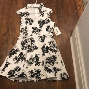 White formal skater dress with black rose detail
